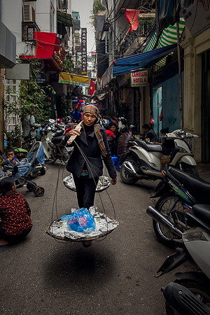 Woman Carrying Goods for Sale
