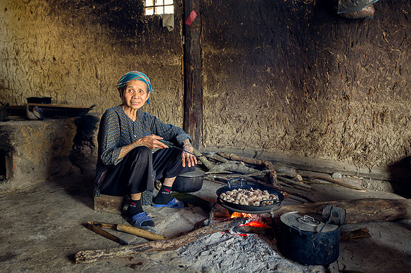 Black Tay Woman Preparing for Tet